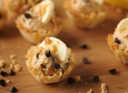 mini pastry cups filled with mousse and chocolate chips.