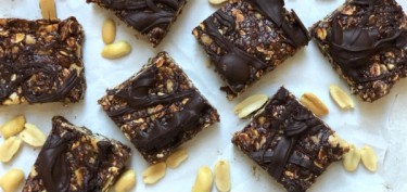 peanut bars with a thick dark chocolate coating.