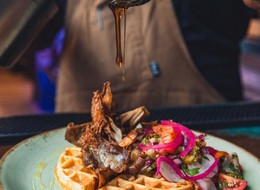 mushrooms and waffles on a plate