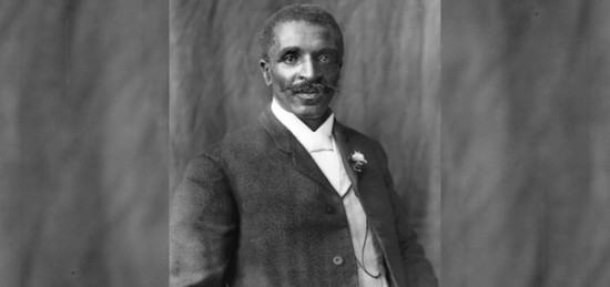 a black and white portrait of Carver in a suit.