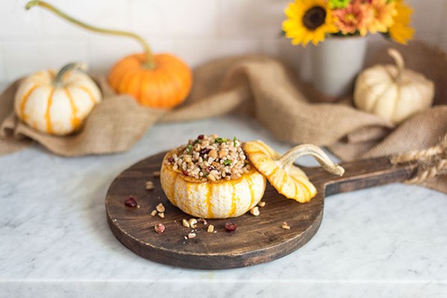 A small pumpkin stuffed with grains and nuts.