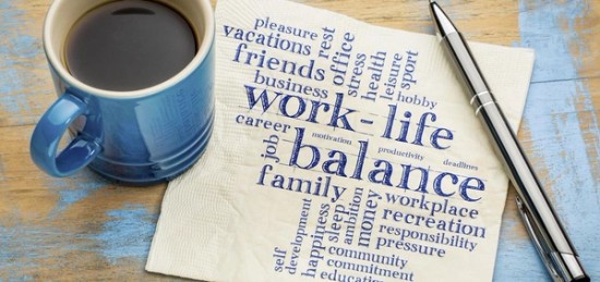 A notepad filled with resolutions like work-life balance.