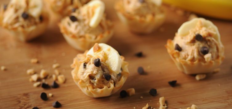 mini pastry cups filled with mousse and chocolate chips.
