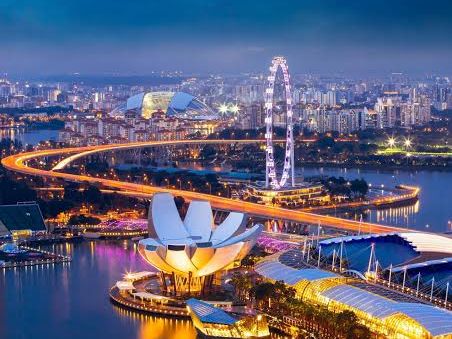 Singapore skyline across the bay at night