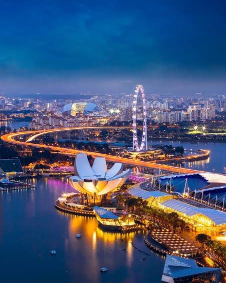 Singapore skyline across the bay at night