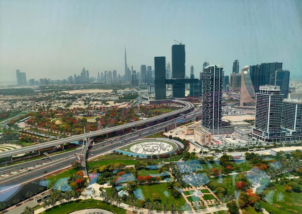 Dubai skyline with modern towers seen across the city at dusk