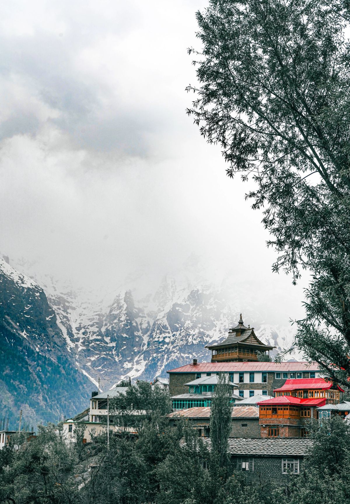Snow-capped Himalayan peaks above Pokhara with Kathmandu temples in view