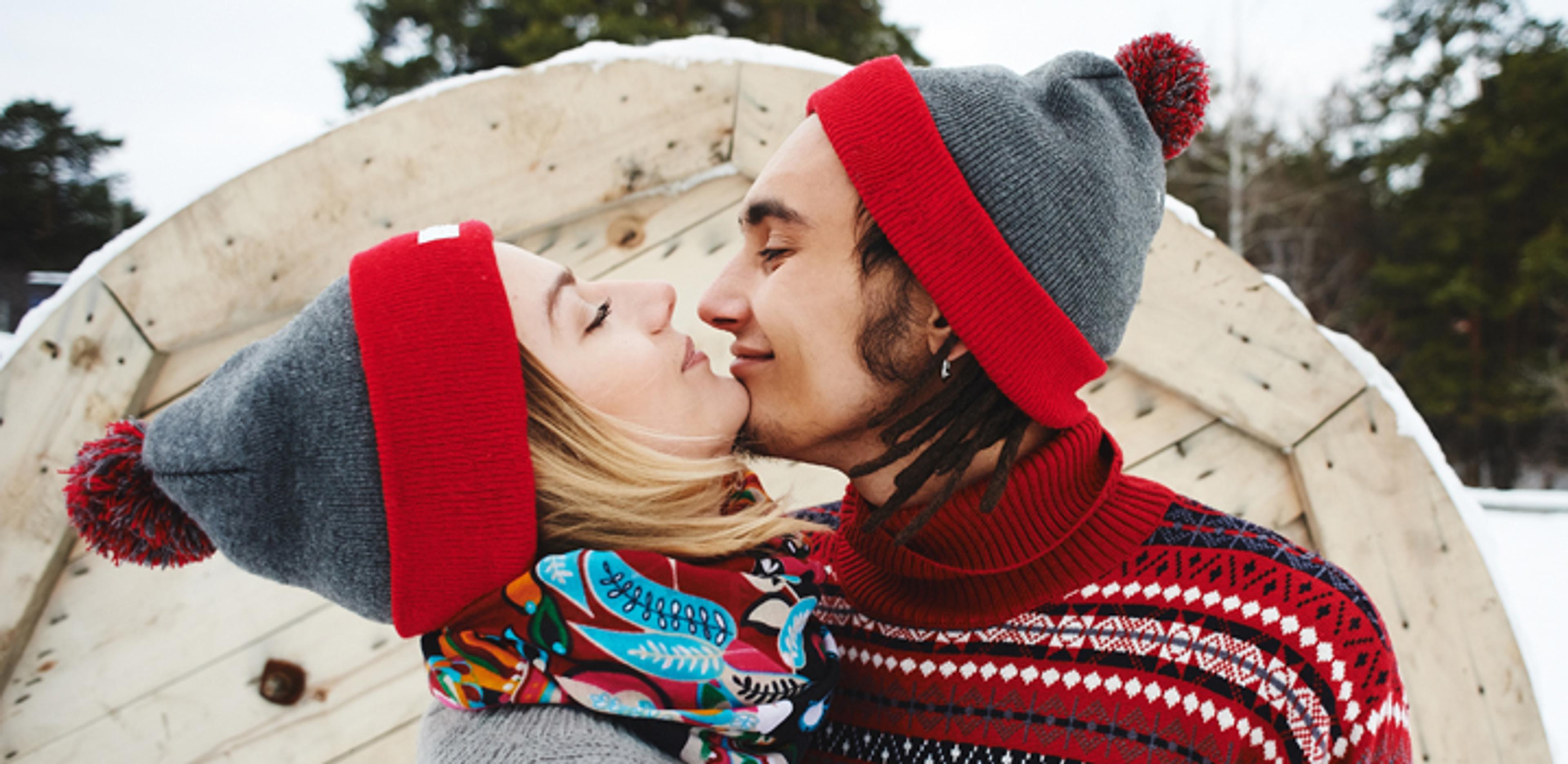 Couple kissing in the snow