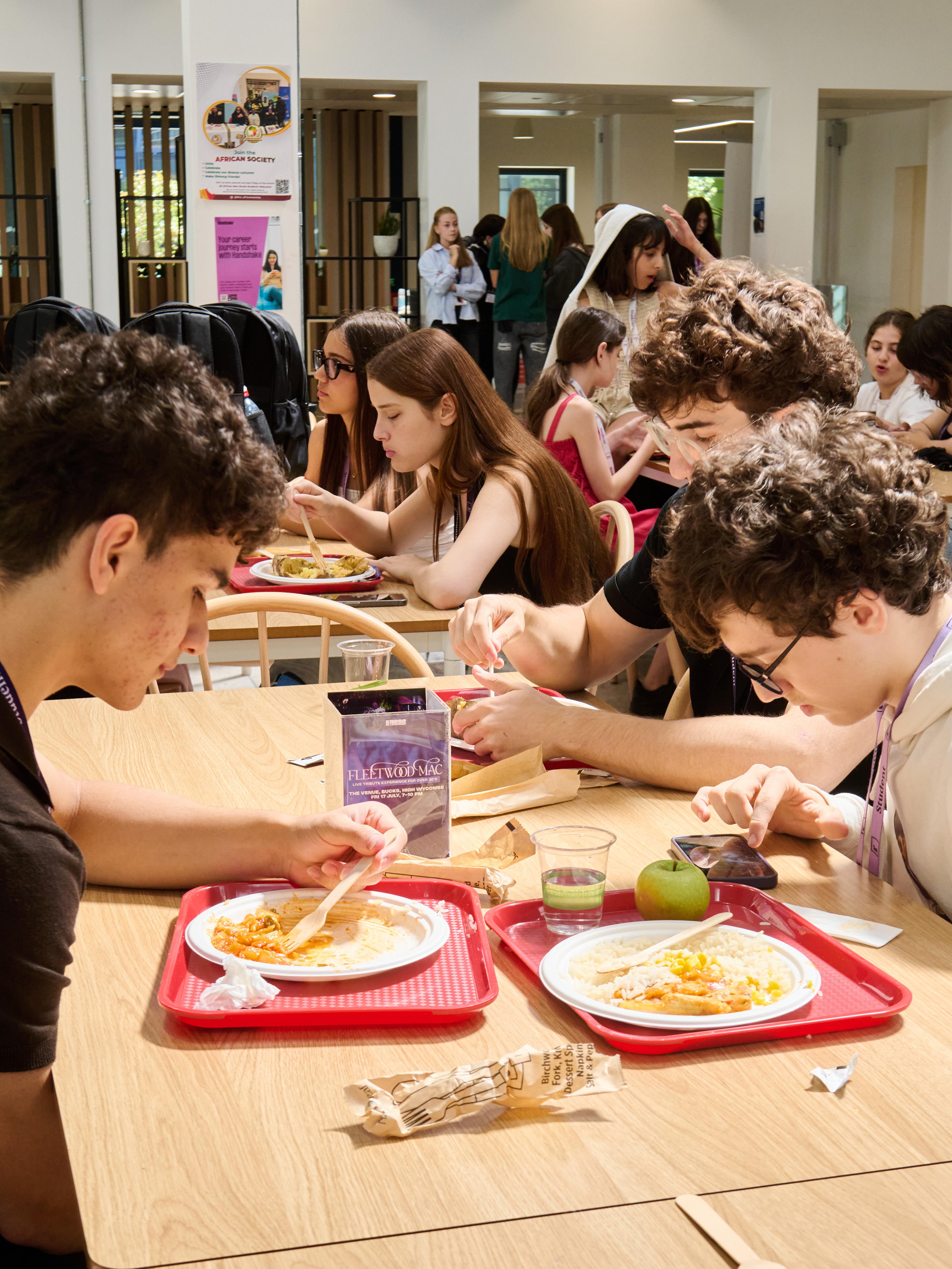 Students enjoying lunch at Buckinghamshire New University