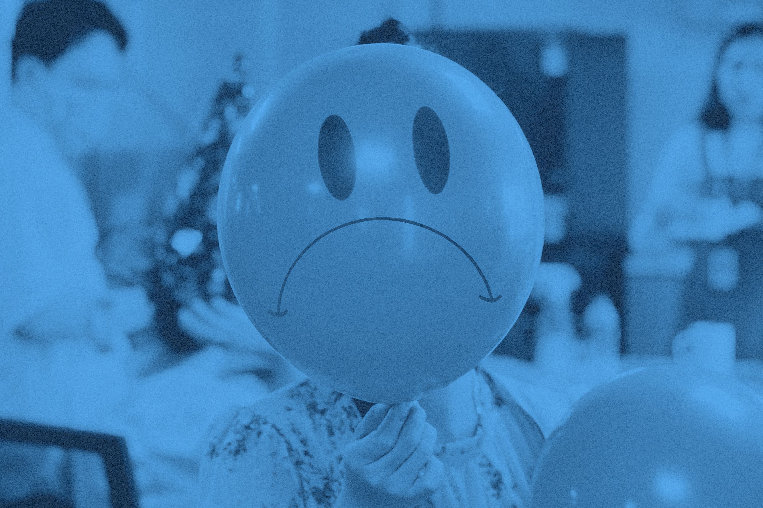 En ballong med en ledsen smiley-figur