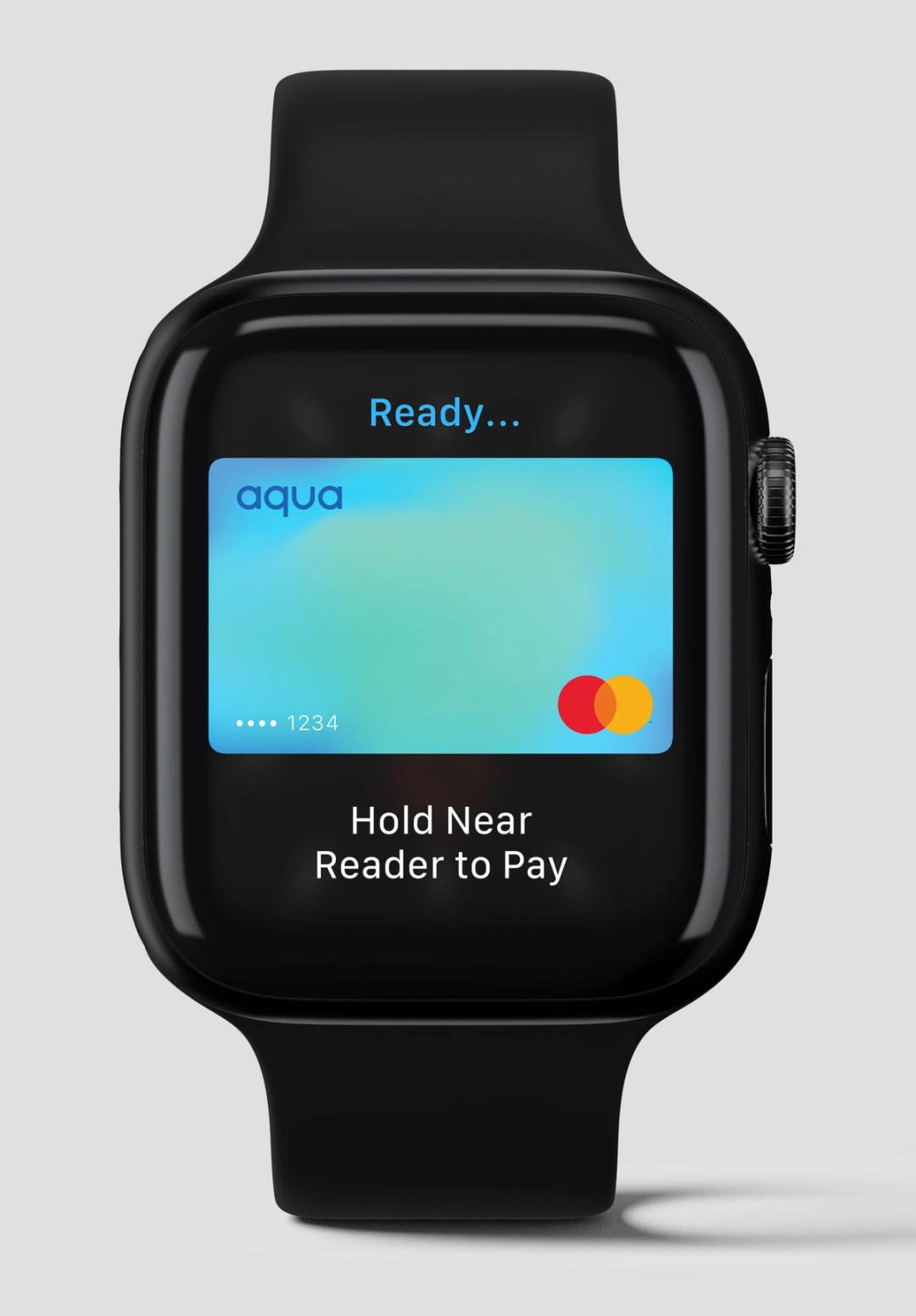 A black apple watch with the Aqua card on screen ready to pay 