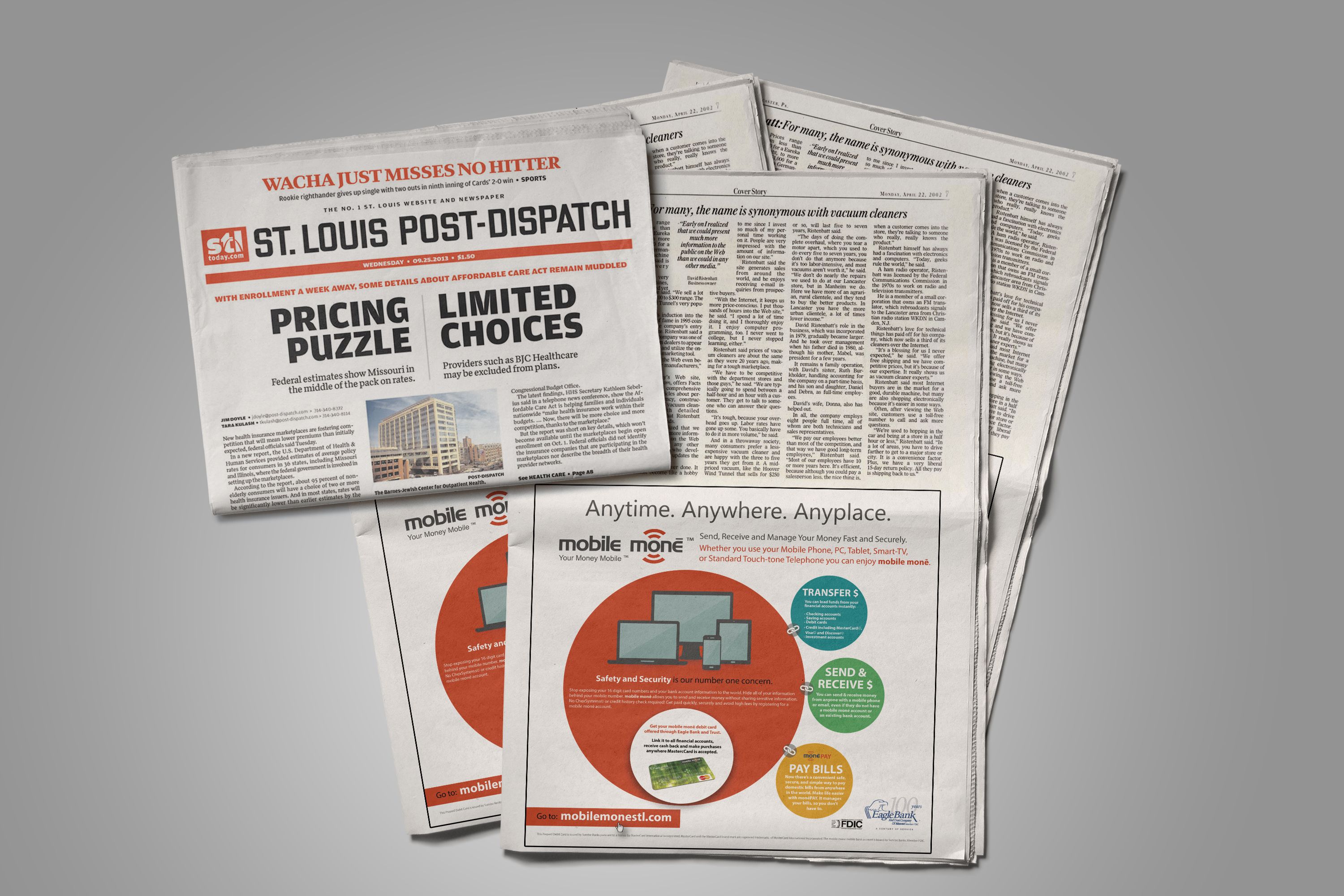Eagle Bank advertising mockup alongside St. Louis Post-Dispatch pages