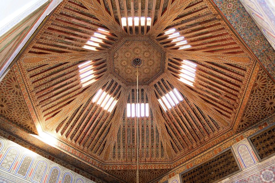 Octagonal dome of carved and painted cedar wood, seen from below
