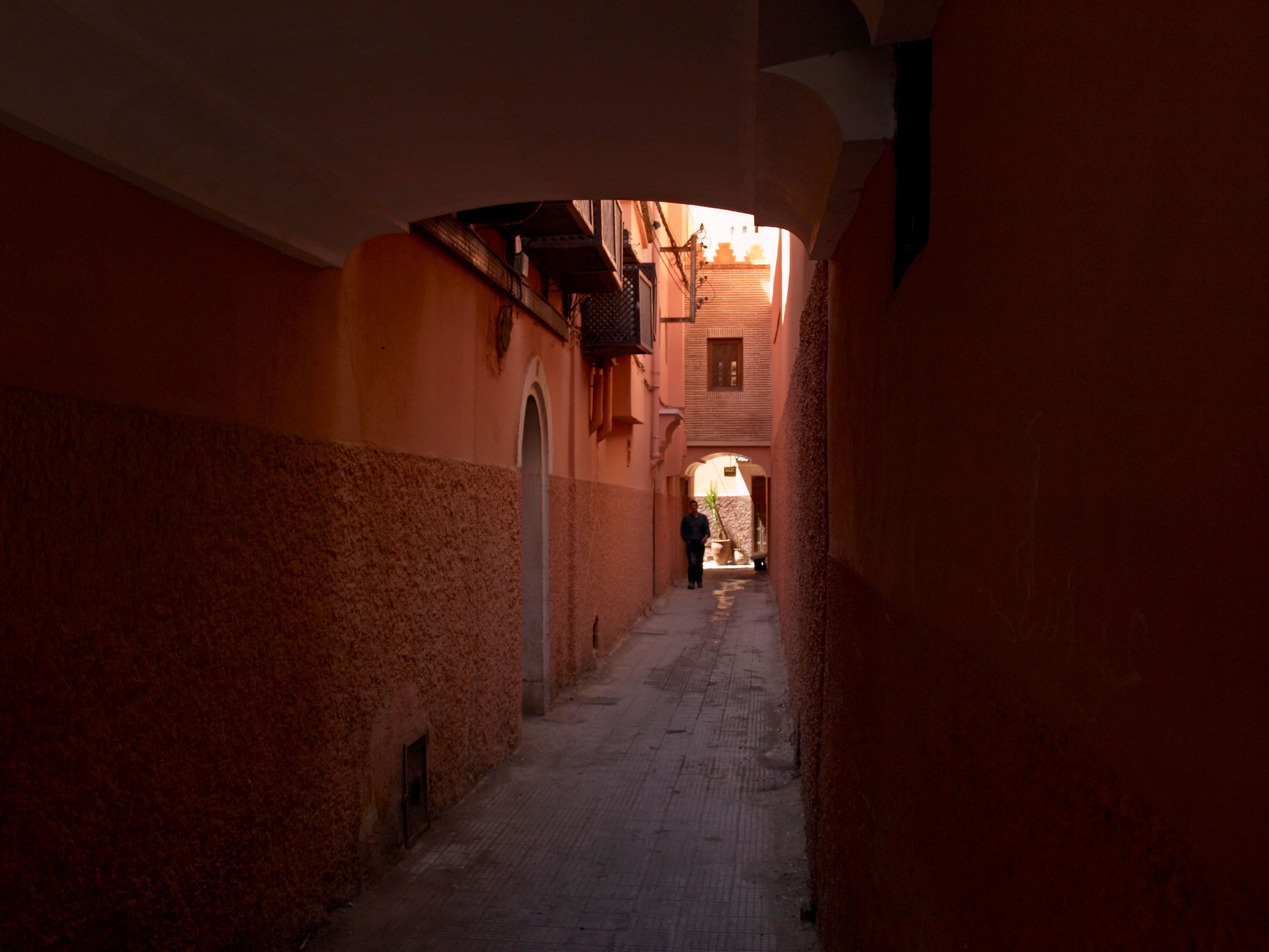 Residential alley near Bab Doukkala, with adjoining ochre houses, in the Marrakech medina