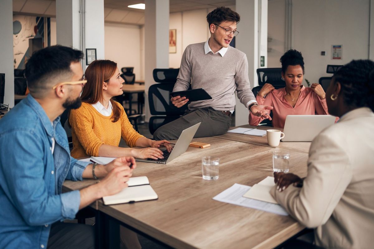 Corporate immigration professionals reviewing employer immigration updates.