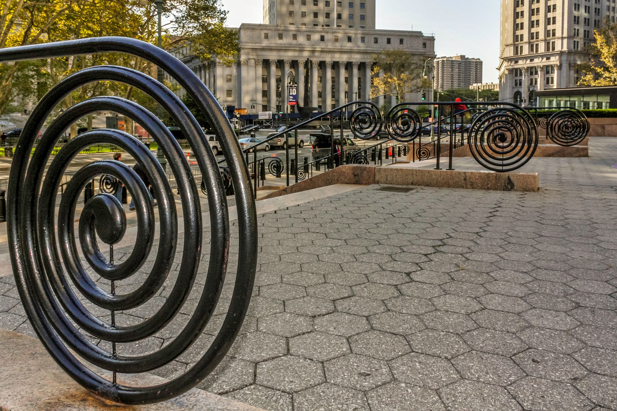black iron spiral railings at foley square outside manhattan's federal plaza, home to the new york immigration court where uscis can now refer asylum cases without an interview