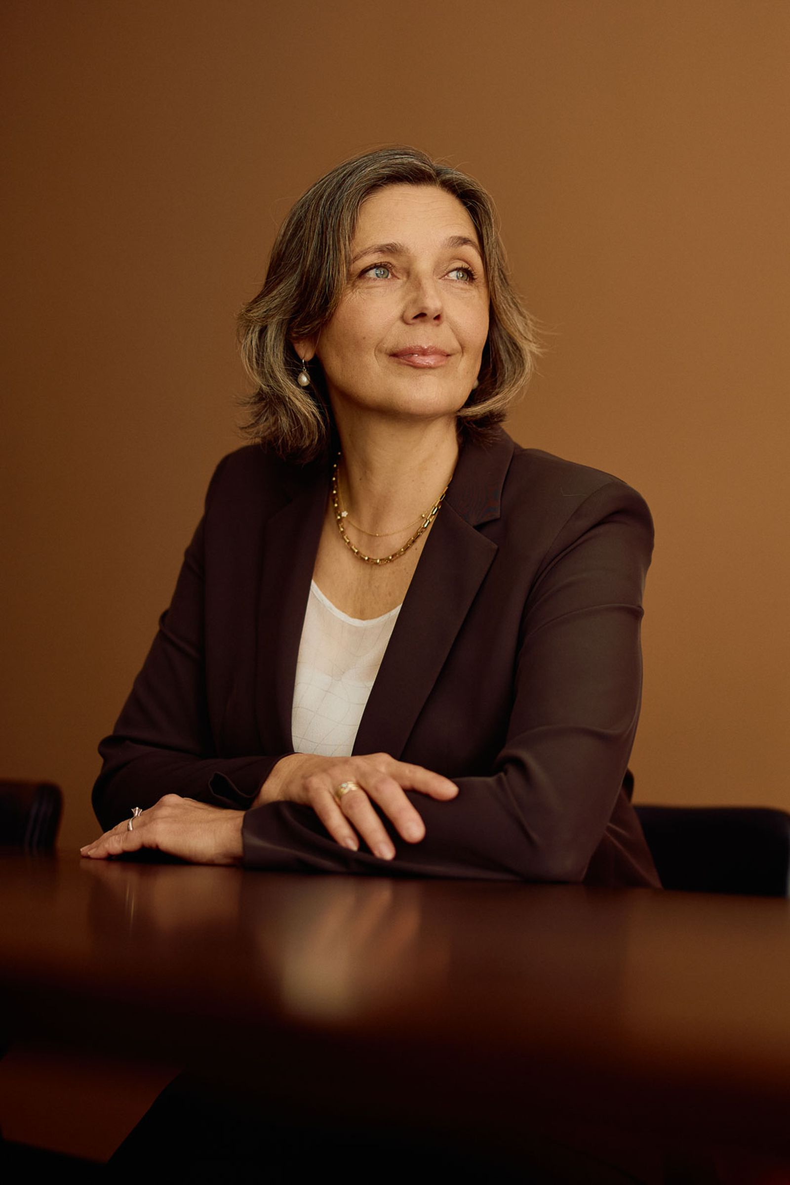 Business owner seated at a conference table