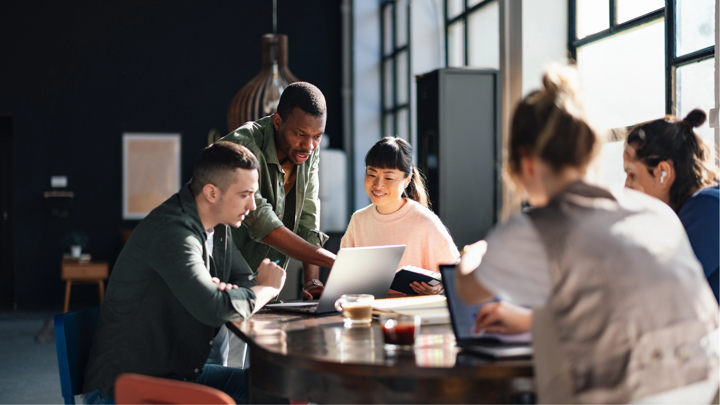 A startup team collaborating around a table