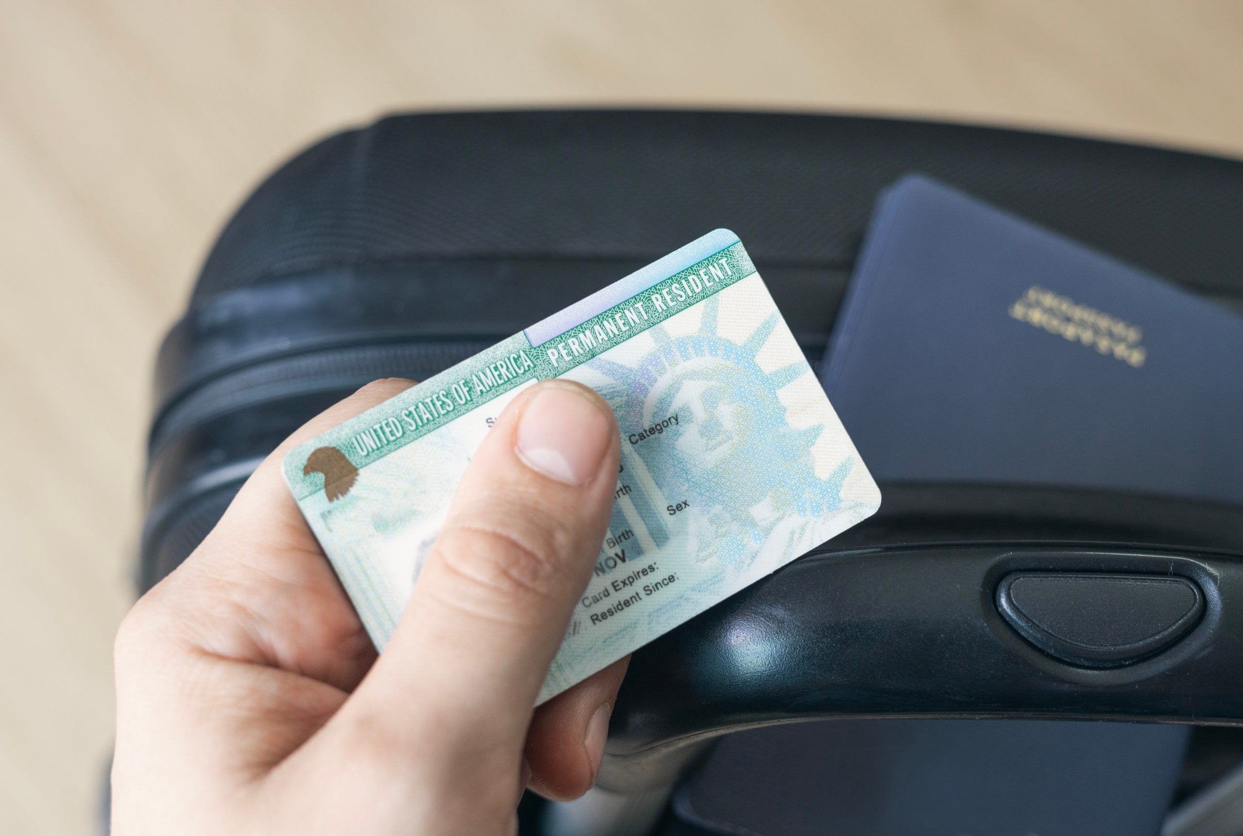 Immigration attorney explaining how the visa processing pause affects adjustment of status