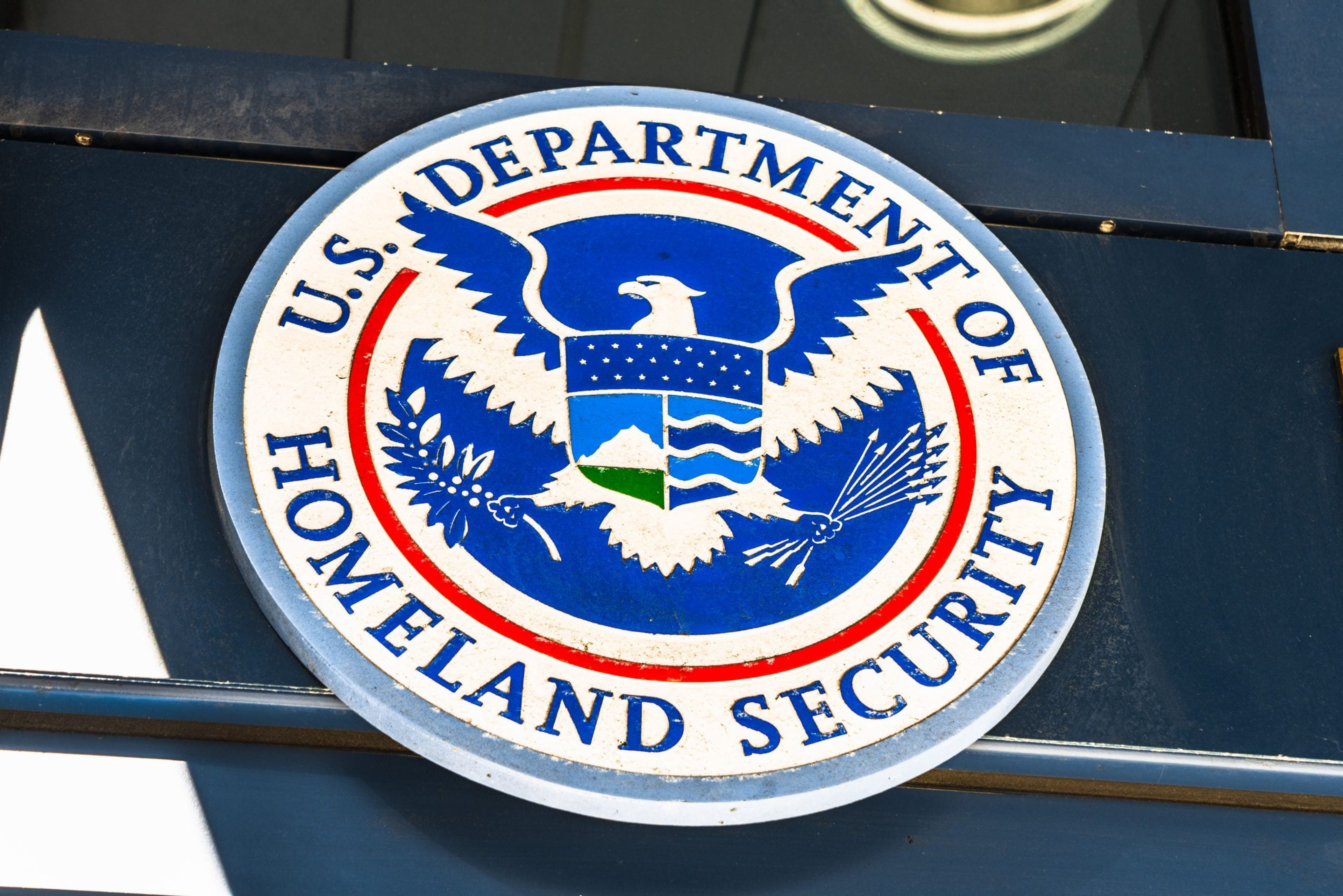 Department of Homeland Security seal on guidance ending automatic EAD extensions