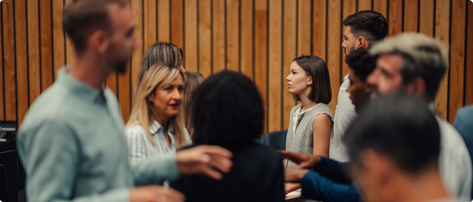 Professionals networking at an international technology event