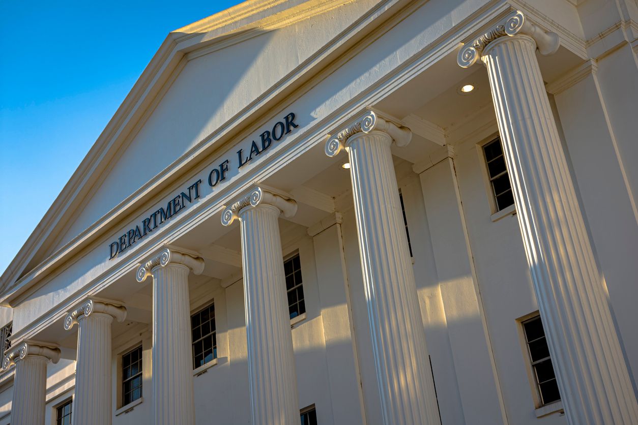 Payroll documents and calculator, as the Labor Department plans higher prevailing wage tiers