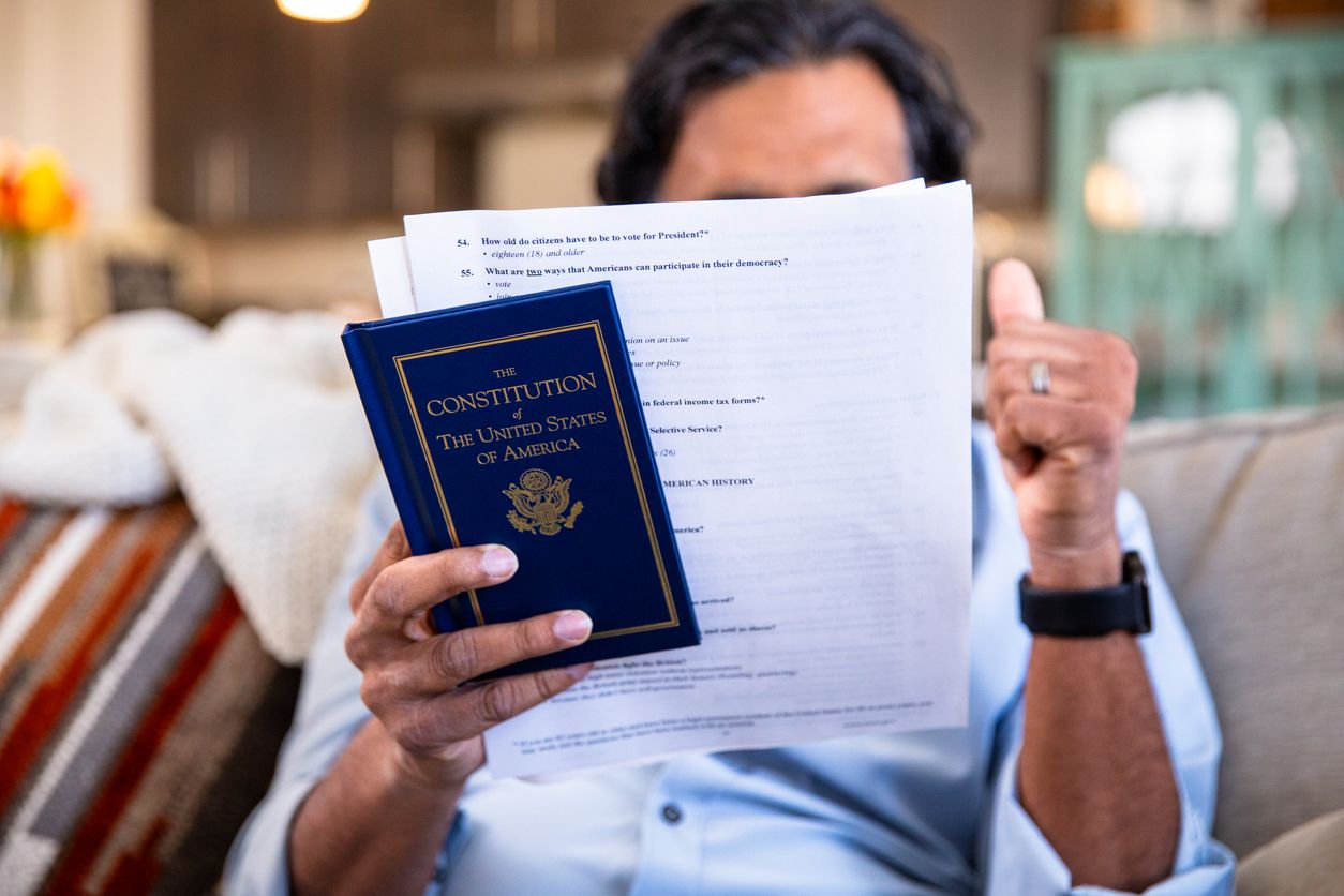 Person studying for the U.S. naturalization test.