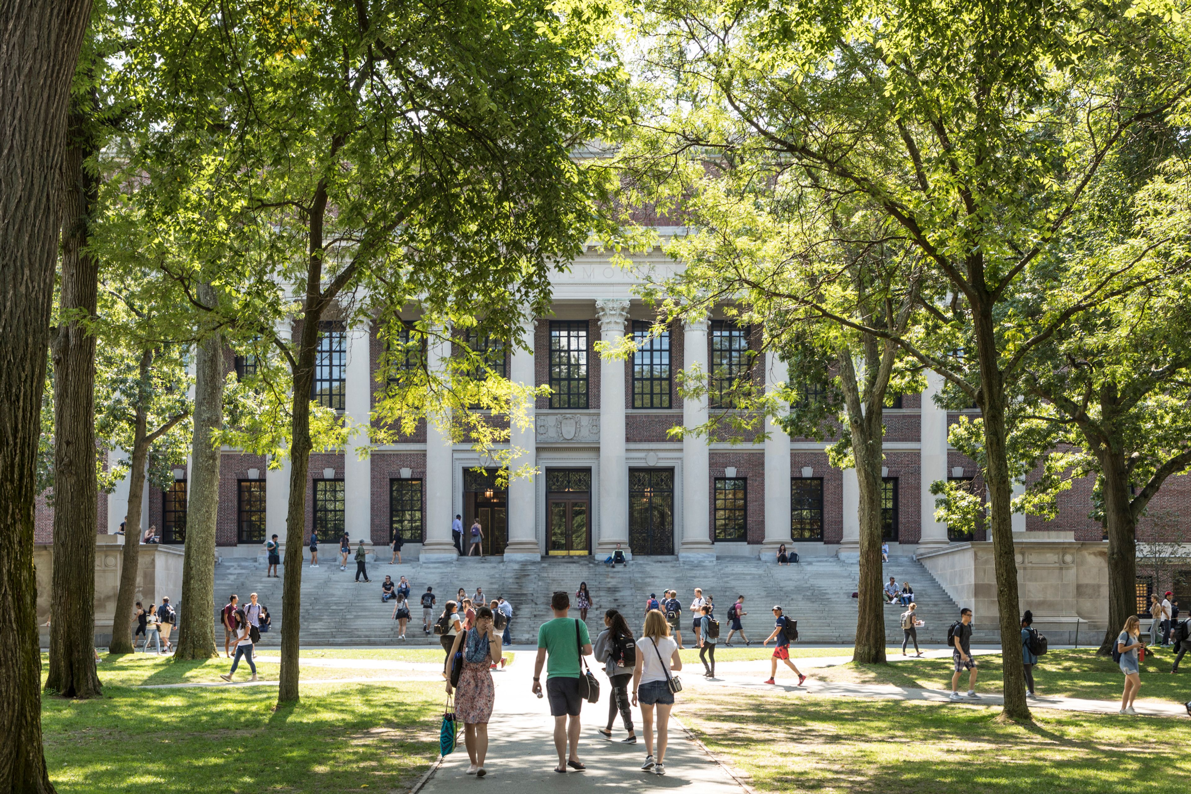 International students and tourists in Harvard Yard, the open old heart of Harvard University campus
