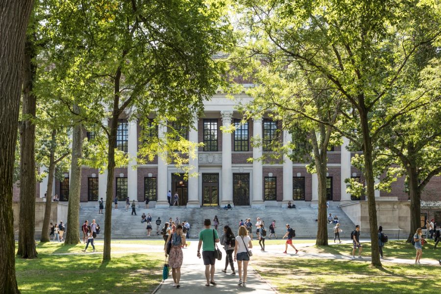 International students and tourists in Harvard Yard, the open old heart of Harvard University campus