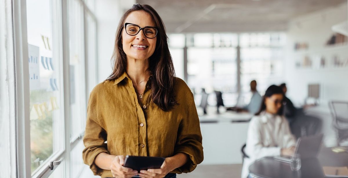 Business woman smiling at the camera