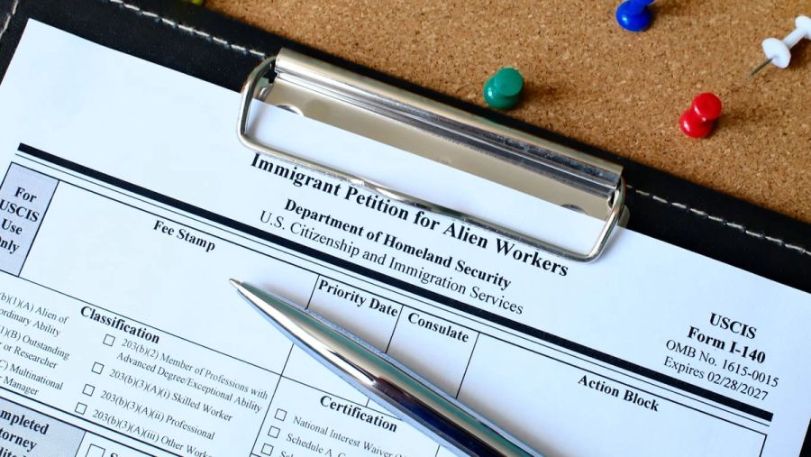 A closeup of USCIS Form I-140, Immigrant Petition for Alien Workers.