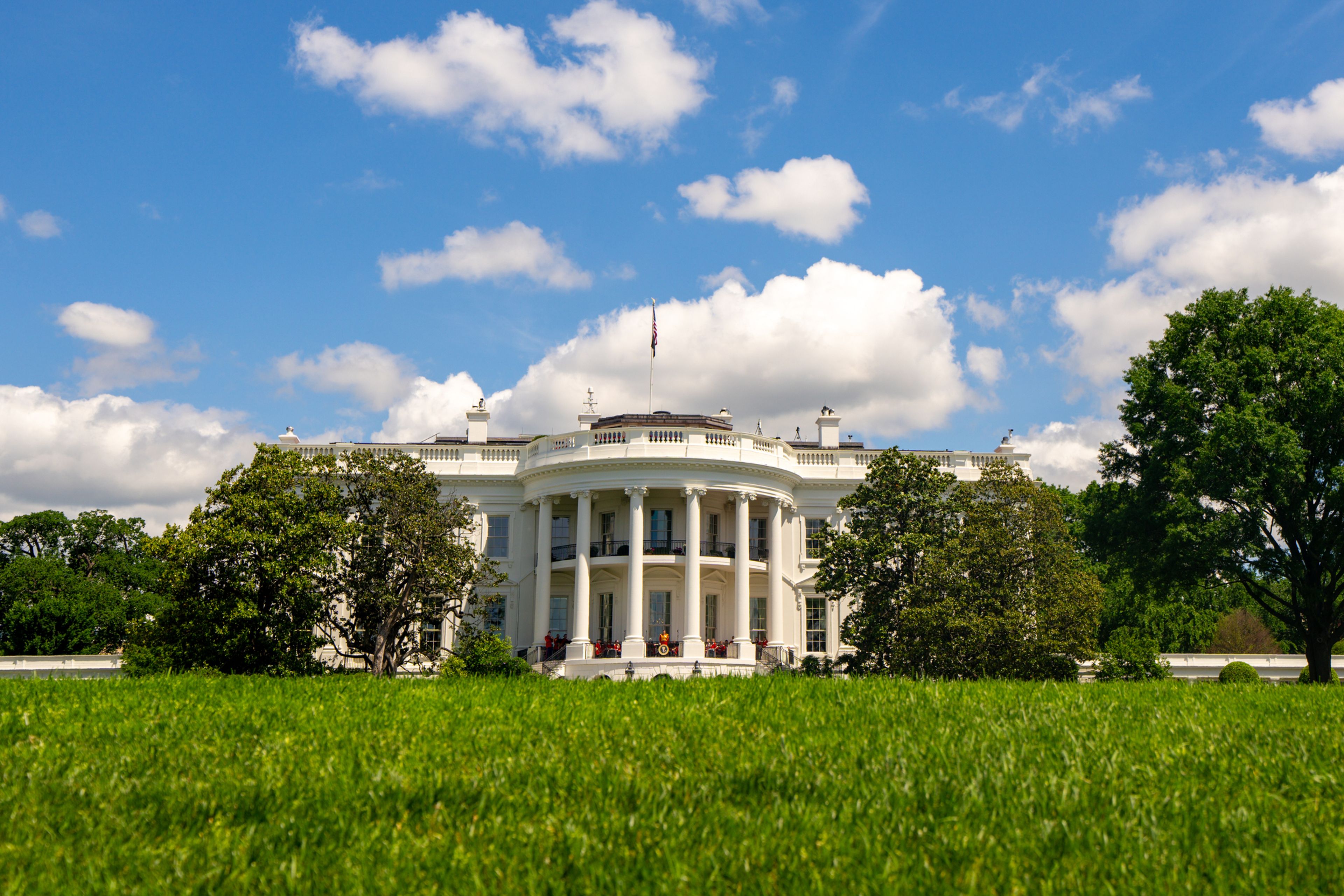 White House in Washington DC. White House and democracy. American presidents residence. White House building. Federal government. The White House with green grass.