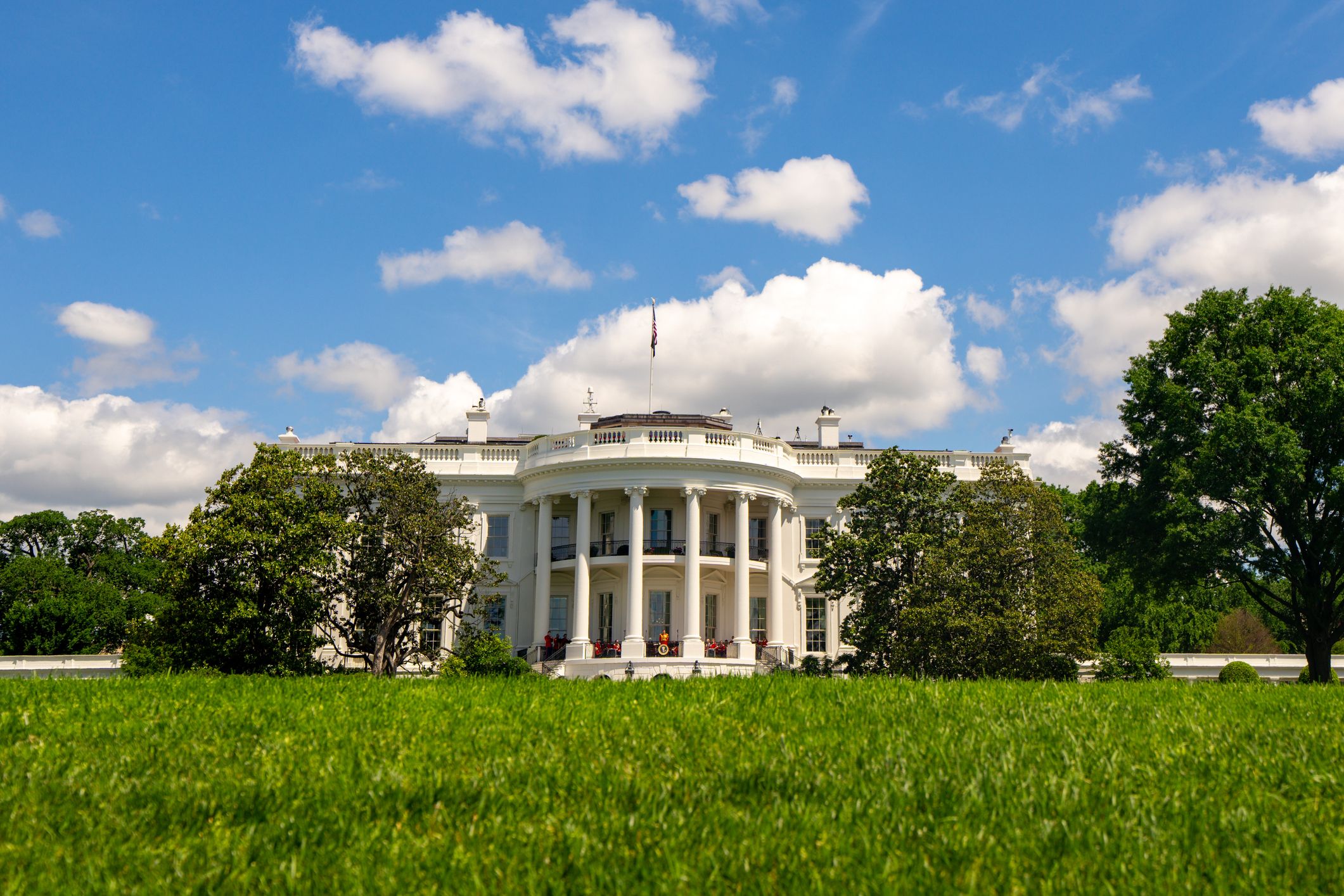 White House in Washington DC. White House and democracy. American presidents residence. White House building. Federal government. The White House with green grass.