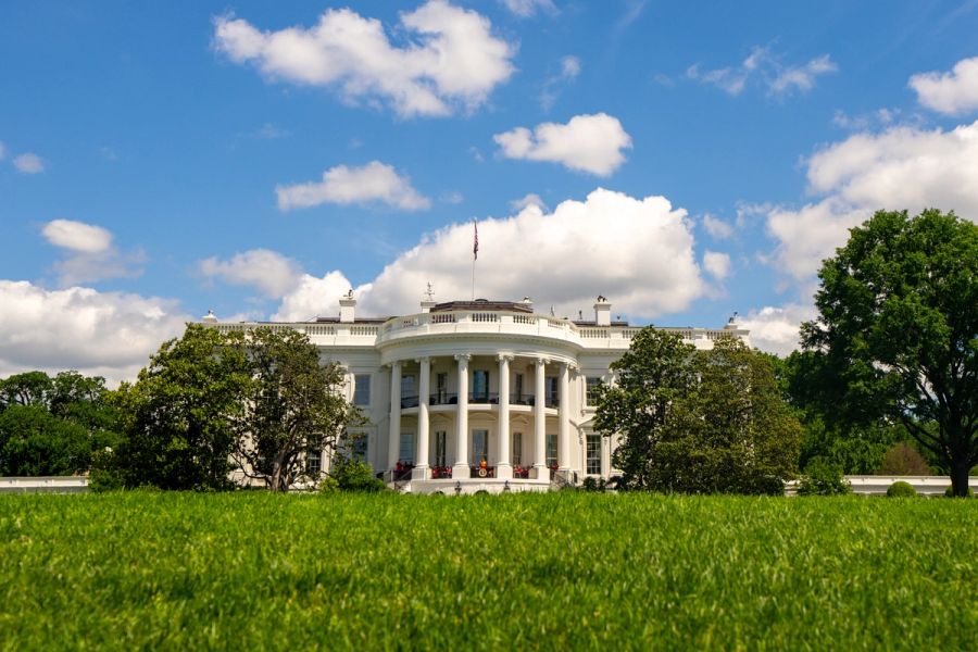 White House in Washington DC. White House and democracy. American presidents residence. White House building. Federal government. The White House with green grass.