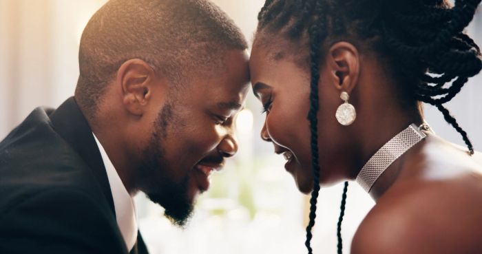 couple at a wedding smiling