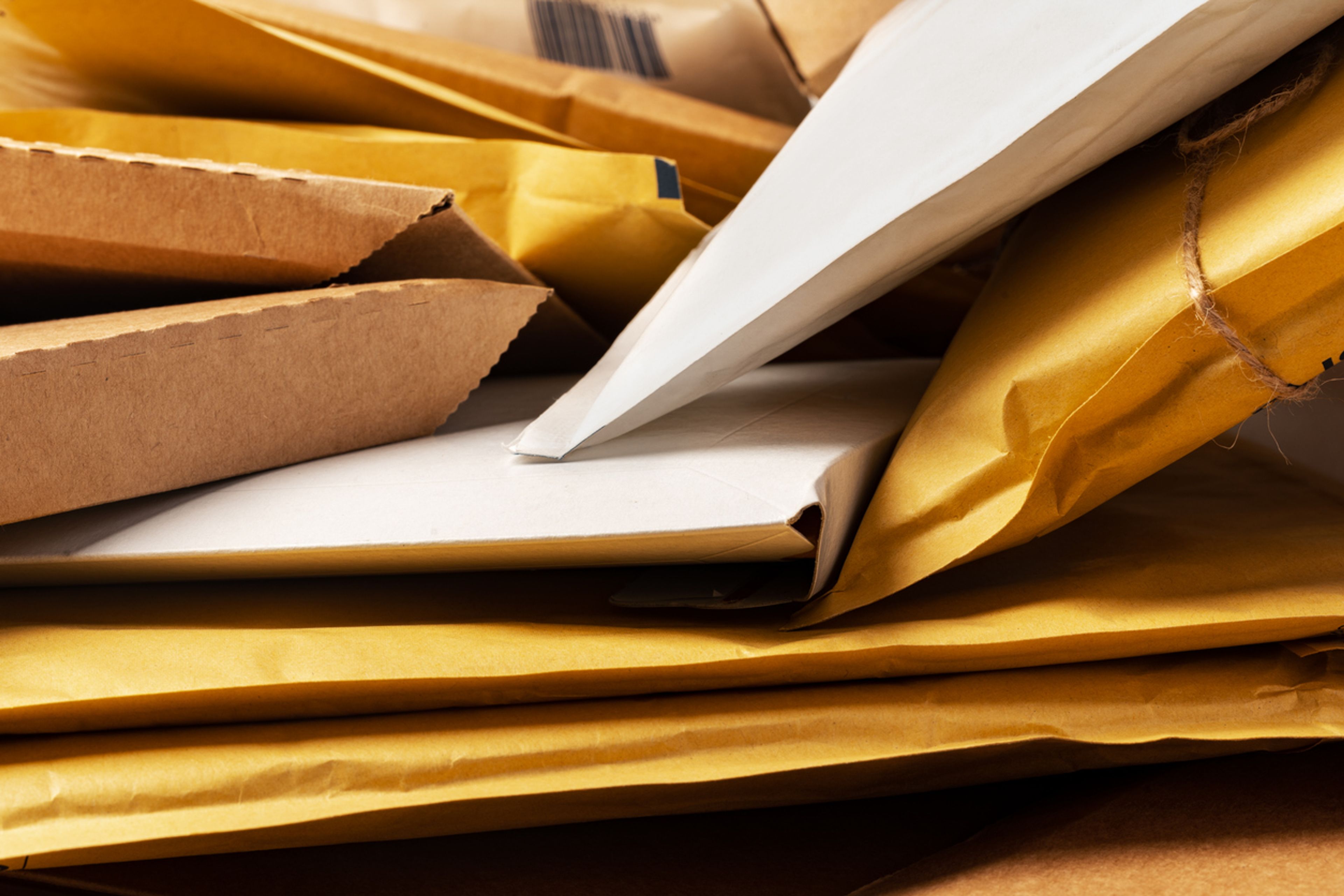 Stacks of unopened USCIS case files representing the FY 2025 backlog