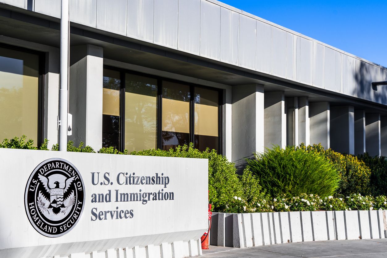USCIS building exterior reflecting tightened deferred action guidance