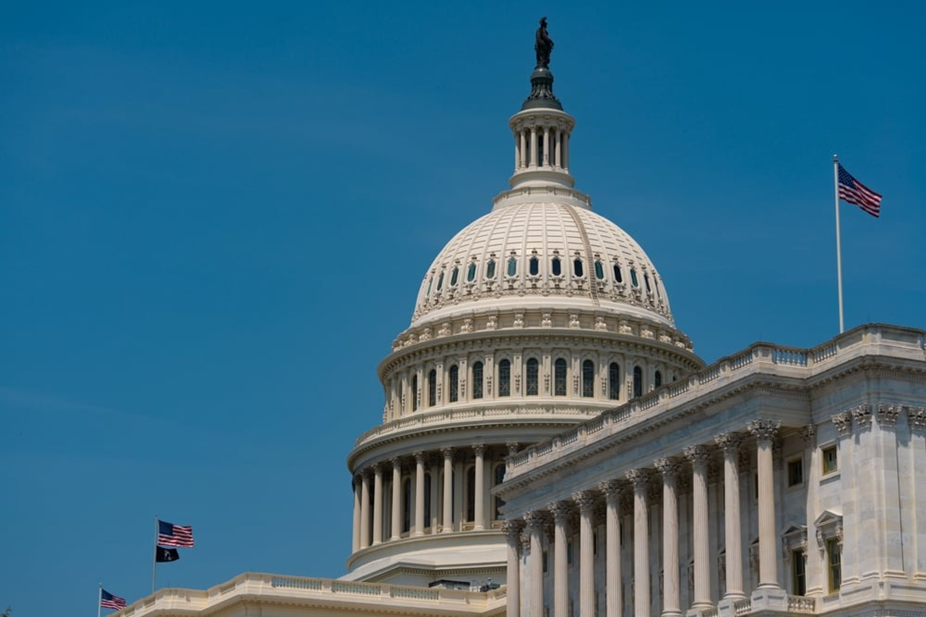 U.S. Capitol building with American flag, backdrop to the February 2026 Visa Bulletin