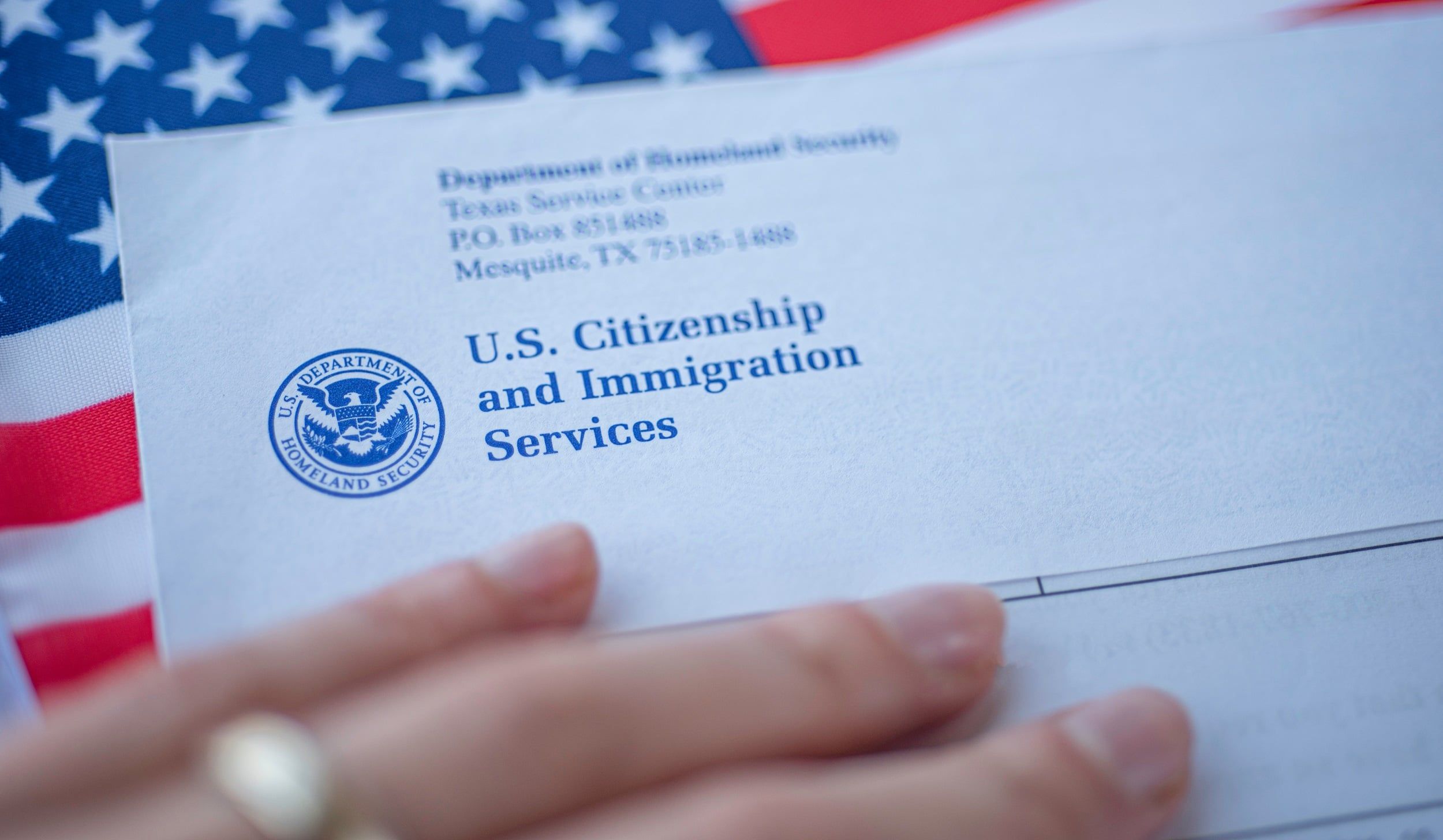 USCIS building exterior, as the October Visa Bulletin switches to filing dates