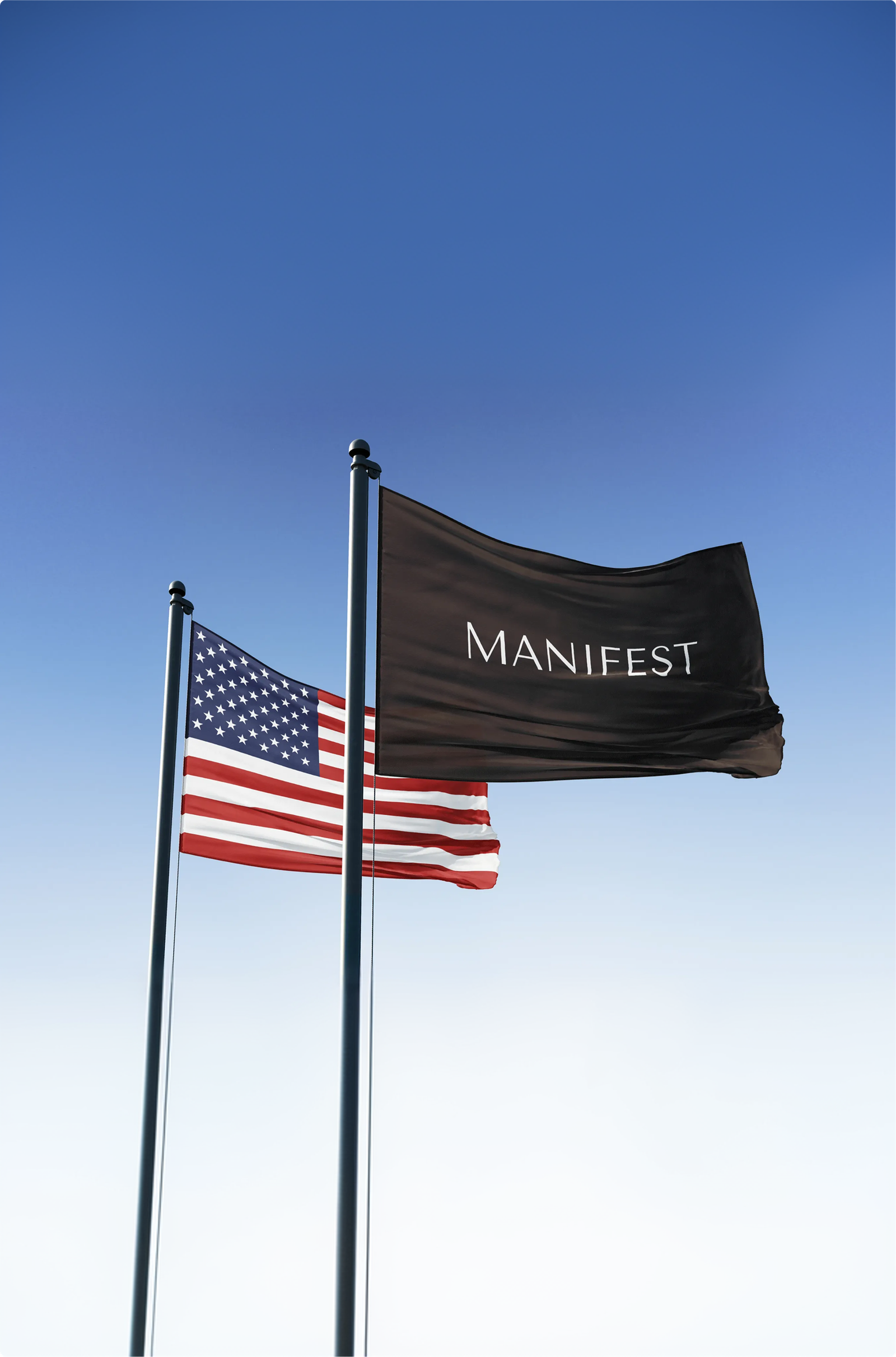 Manifest and American flags waving against a blue sky.