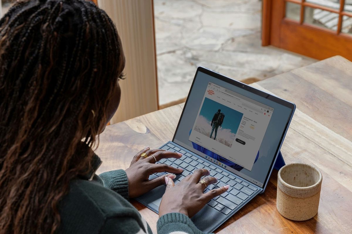 Business woman working with files on laptop