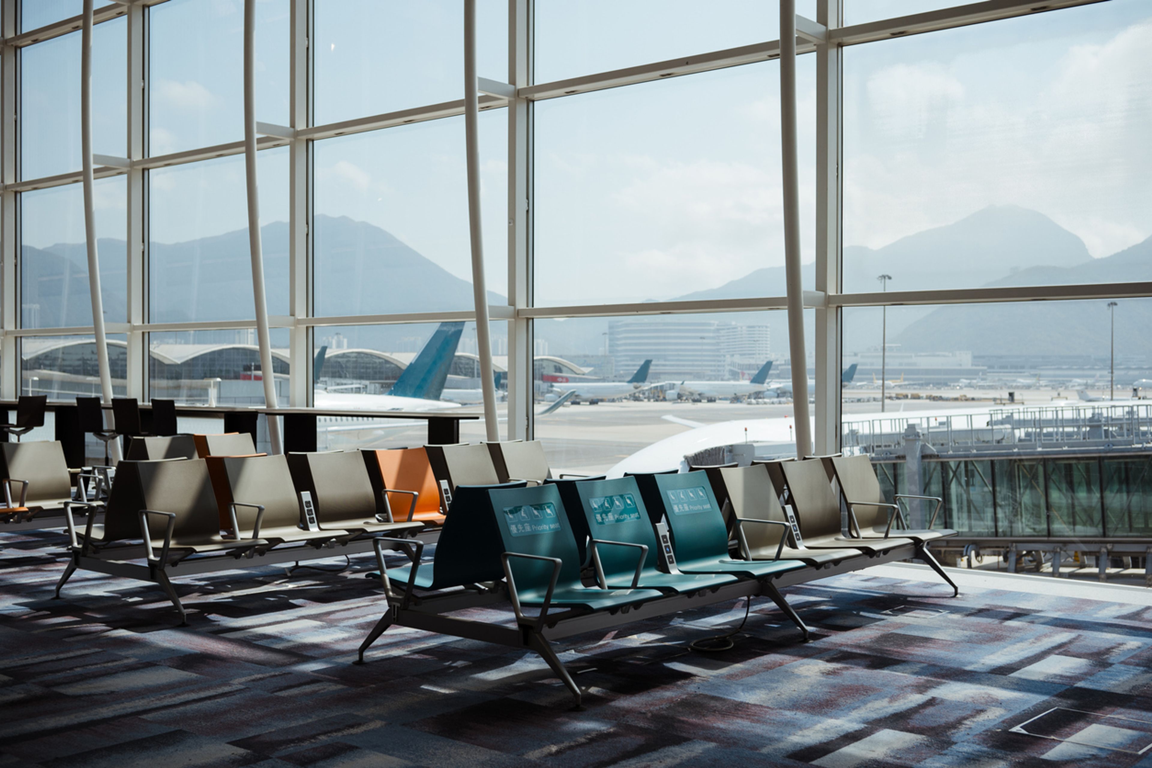 Rows of seats at an airport terminal.