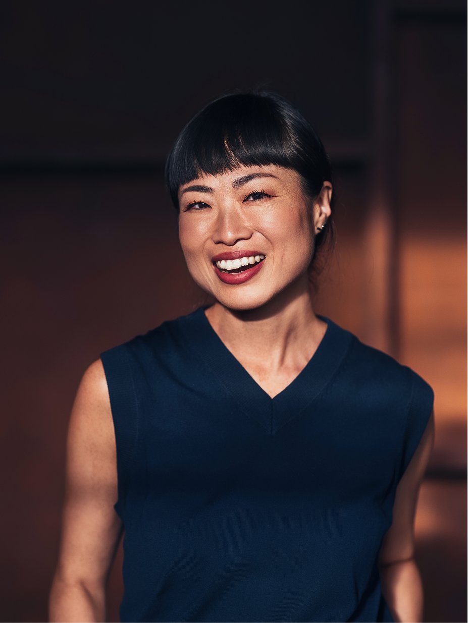A founder smiling in a professional portrait