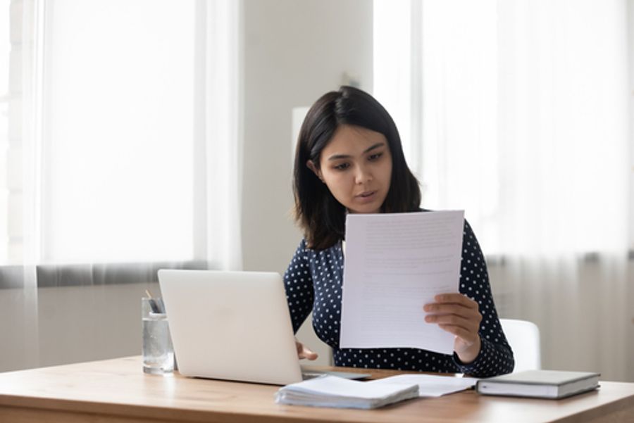 i-912-woman-looking-at-form