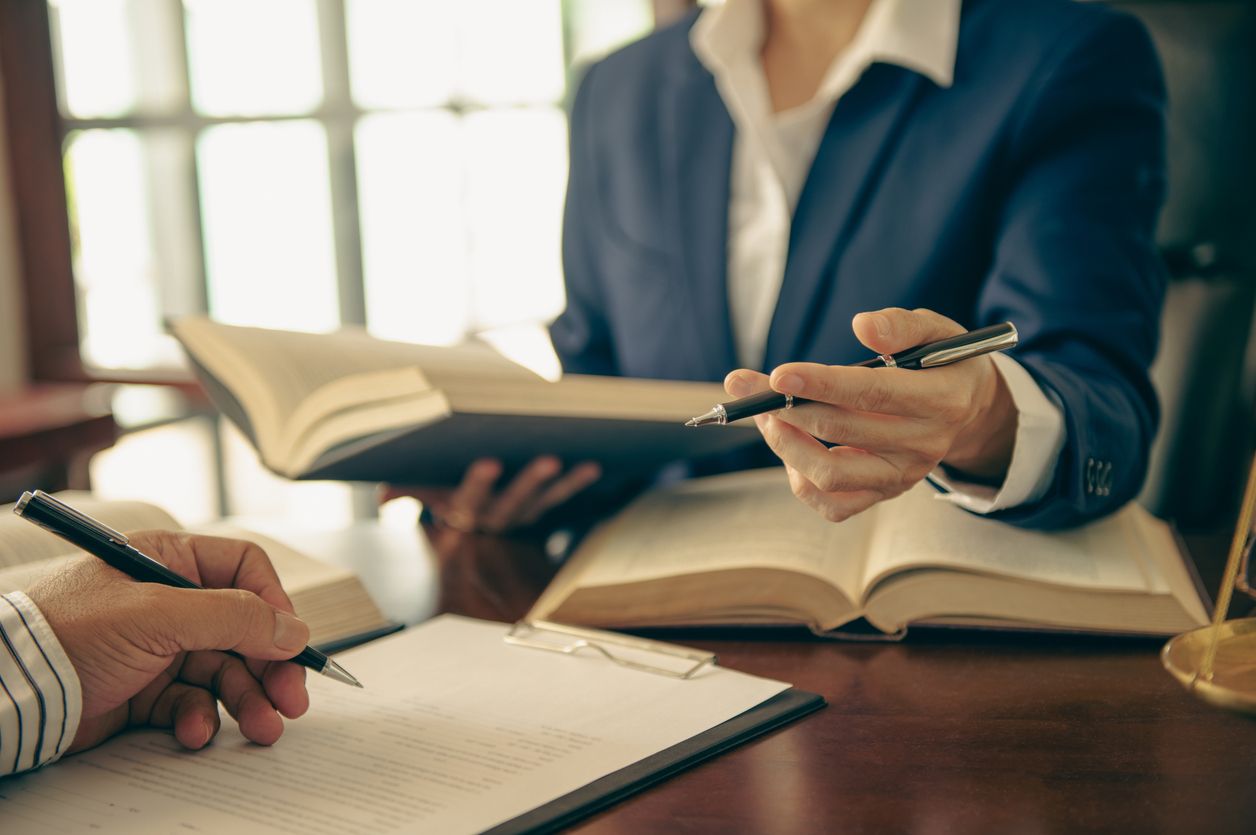 Client meeting with an immigration law firm attorney to set communication expectations