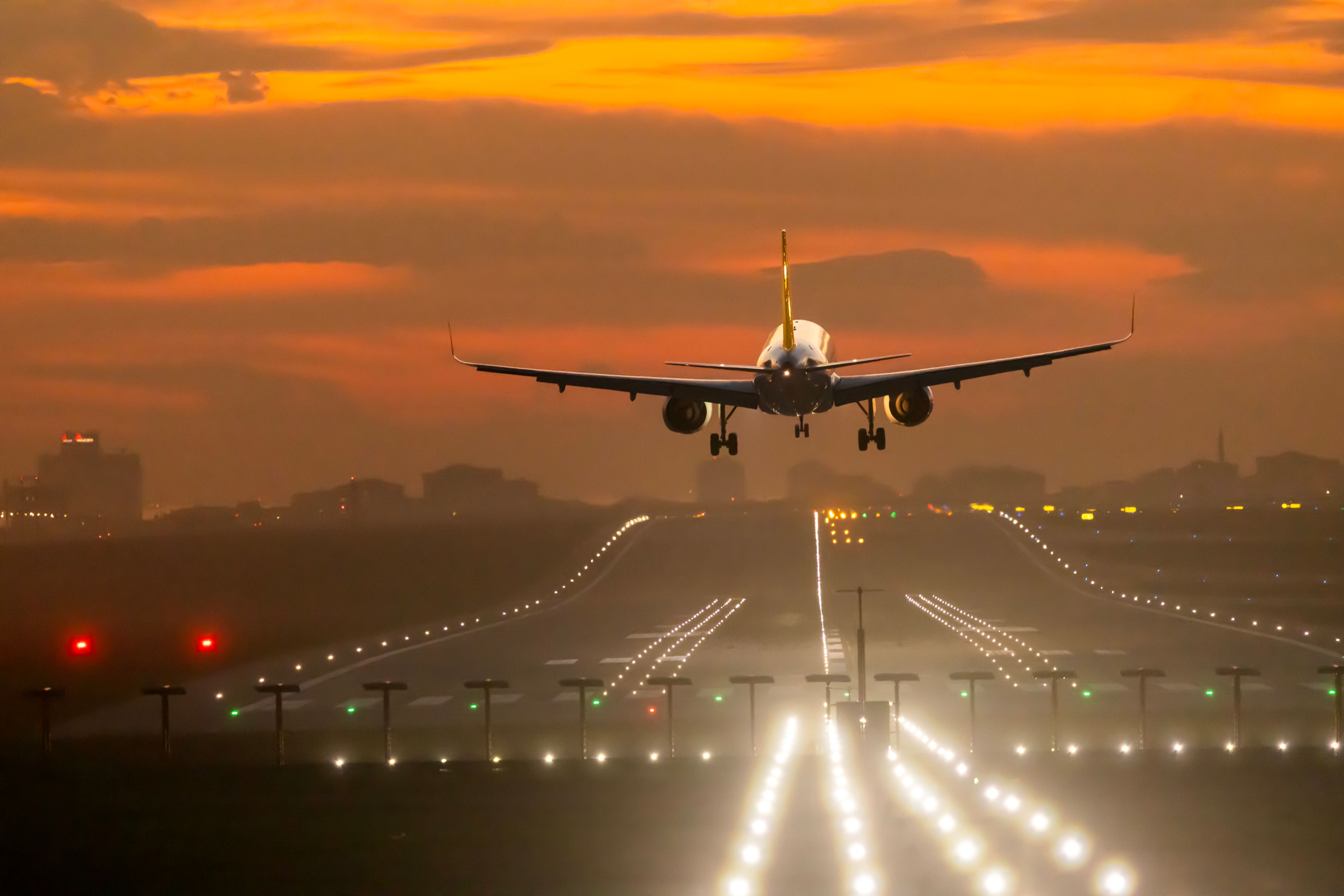 commercial airplane departing at a U.S. airport, illustrating new executive orders targeting birth tourism and birthright citizenship