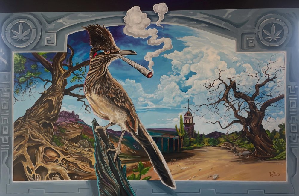 A mural of a bird on a branch smoking a joint