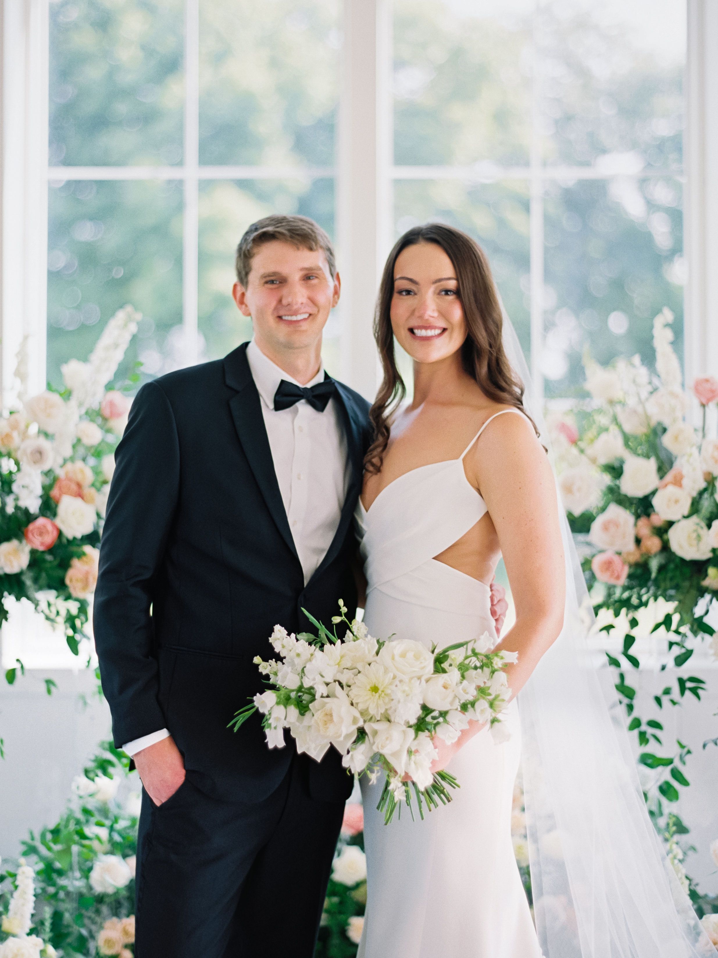 bride and groom with bouquet
