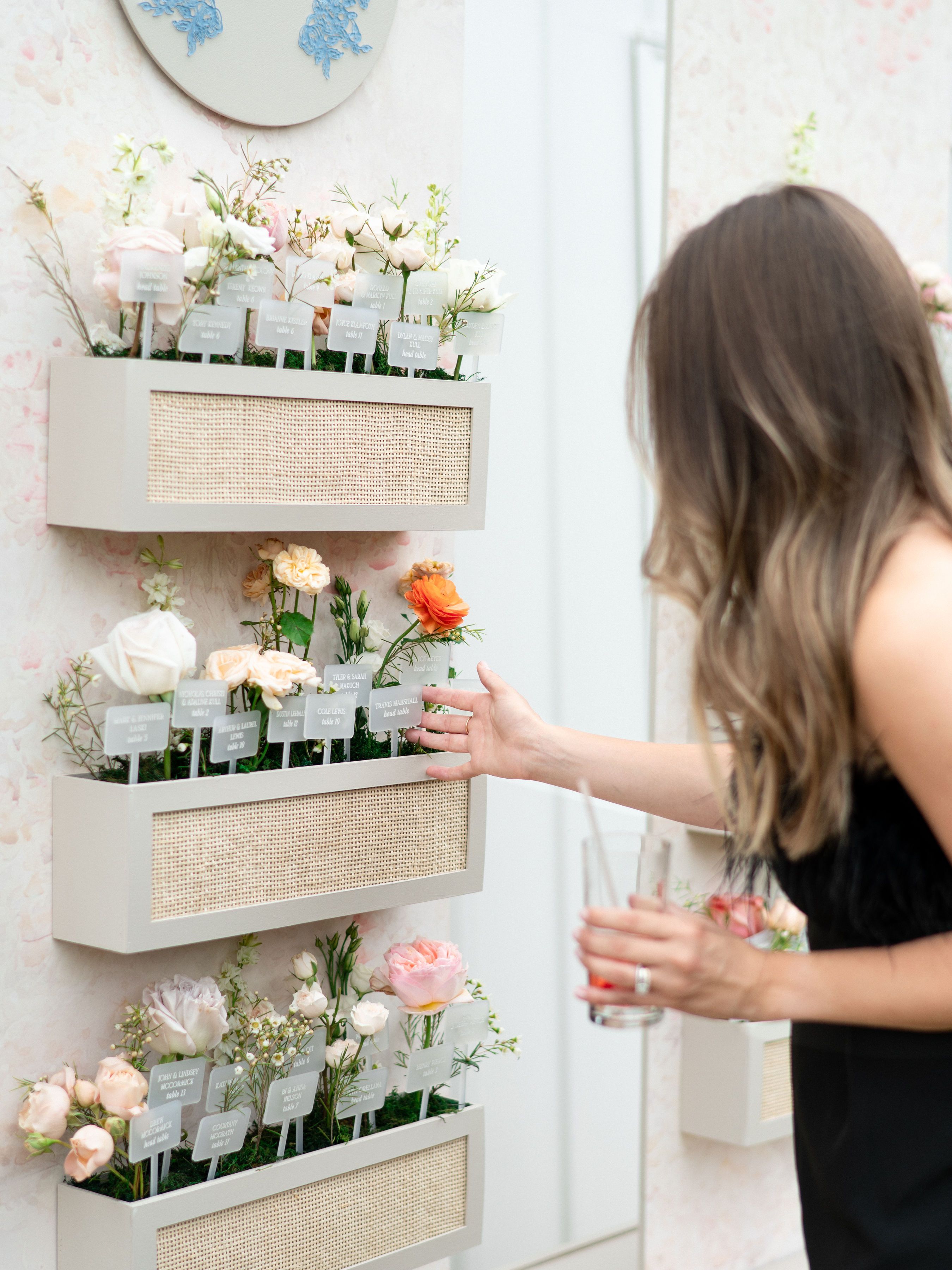 escort card flower wall