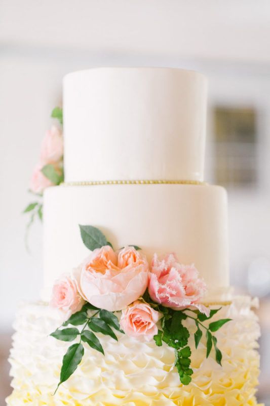 cake flowers of a garden rose 'peachJuliet', pink spray roses, and pink fringed tulip